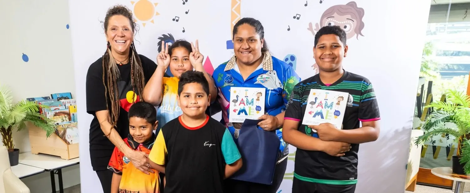 Children and adults showcasing the 